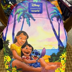 Loungefly Disney Purple and Green Backpack